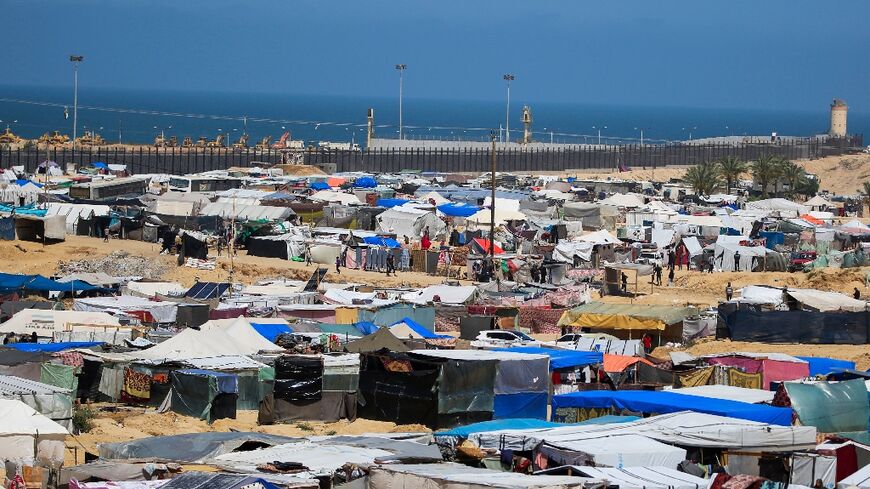 Al-Mawasi, where the field hispital is based, is an area of sand dunes on the Gaza coast that tens of thousands of displaced Palestinian civilians have turned into a vast tent city