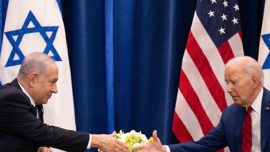 TOPSHOT - US President Joe Biden shakes hands with Israeli Prime Minister Benjamin Netanyahu as they meet on the sidelines of the 78th United Nations General Assembly in New York City on September 20, 2023. (Photo by Jim WATSON / AFP) (Photo by JIM WATSON/AFP via Getty Images)