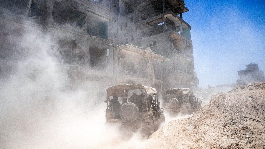 Israeli army vehicles inside the southern Gaza Strip on July 3, 2024