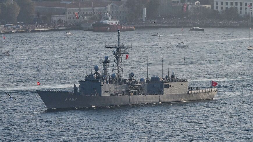 This picture taken on October 29, 2023, in Istanbul shows Turkish naval forces warship Frigates TCG F 497, Goksu sails during a military naval parade on Bosphorus to mark 100th anniversary celebrations of Turkish republic. 