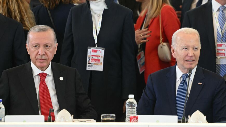 Turkish President Recep Tayyip Erdogan and US President Joe Biden take part in a working session on Artificial Intelligence (AI), Energy, Africa-Mediterranean at the Borgo Egnazia resort during the G7 Summit in Savelletri near Bari, Italy, on June 14, 2024. 