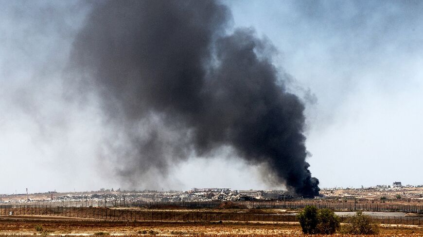 Smoke rises over Gaza on July 9, 2024, amid the ongoing conflict between Israel and the Palestinian militant group Hamas