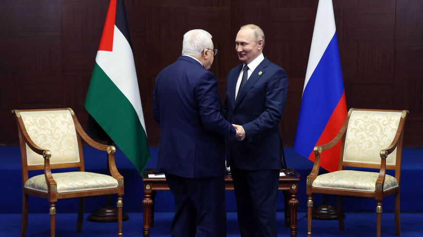 Russian President Vladimir Putin meets with Palestinian President Mahmoud Abbas on the sidelines of the Sixth Summit of the Conference on Interaction and Confidence Building Measures in Asia, Astana, Kazakhstan, Oct. 13, 2022.