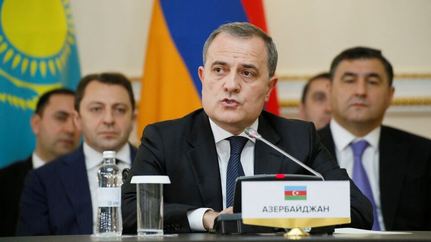 Azerbaijani Foreign Minister Jeyhun Bayramov speaks during a meeting with Armenia's foreign minister and Kazakhstan's foreign minister in Almaty, on May 10, 2024.