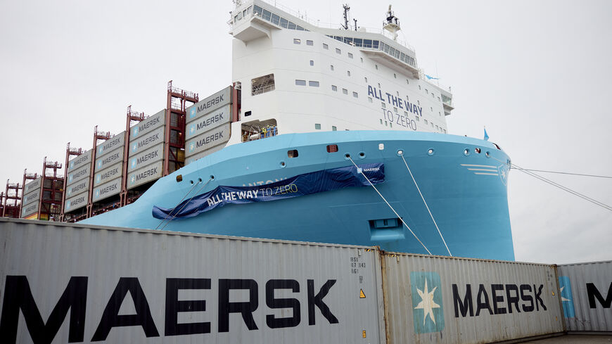 The low-emission container ship Antonia Maersk by Danish shipping company A.P. Moller - Maersk is seen behind containers during its christening at the harbor of Aarhus, Denmark, on August 9, 2024. The ship sails on green methanol. (Photo by Mikkel Berg Pedersen / Ritzau Scanpix / AFP) / Denmark OUT (Photo by MIKKEL BERG PEDERSEN/Ritzau Scanpix/AFP via Getty Images)