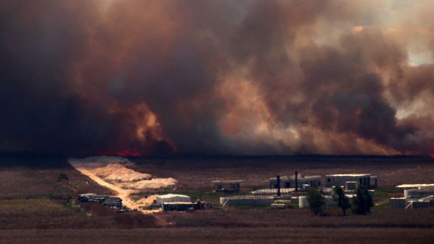 Fire sweeps over the Marjayoun plain in southern Lebanon near the border with Israel after being hit by Israeli shelling on August 16, 2024, amid the ongoing cross-border clashes between Israeli troops and Hezbollah fighters.