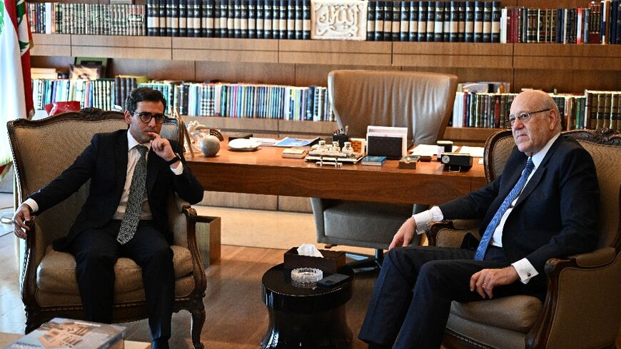 Lebanon's caretaker Prime Minister Najib Mikati (R) meets with France's Foreign Minister Stephane Sejourne in Beirut