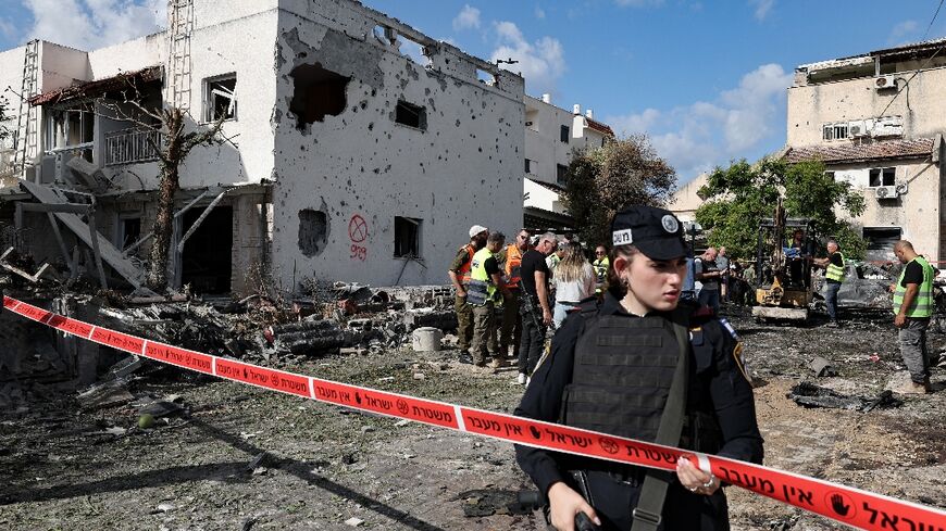 Damage in an area near north Israel's Haifa city after rocket fire from Lebanon