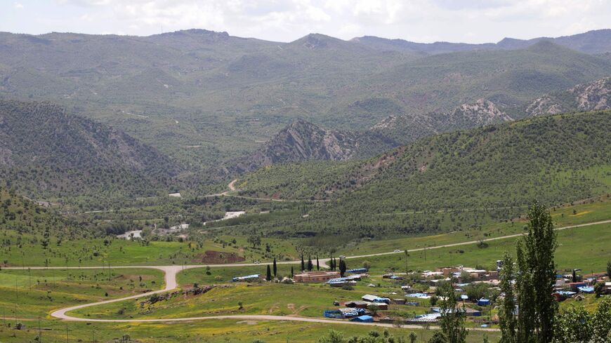 In this picture taken on April 25, 2023, mountains overlook the village of Hiror near the Turkish border in northern Iraq's autonomous Kurdish region, where firefights occur between the Turkish army and fighters from the Kurdistan Workers' Party (PKK). 