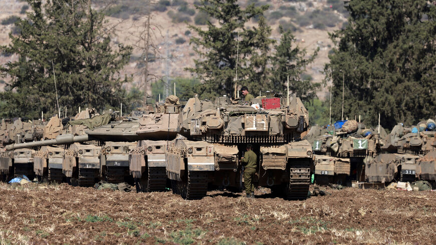 Israeli army tanks are deployed in the Upper Galilee region of northern Israel near the border with Lebanon, Sept. 29, 2024.