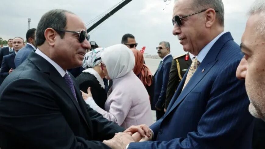 Turkey’s President Tayyip Erdogan is welcomed by Egypt's President Abdel Fattah al-Sisi at the airport in Cairo, Egypt February 14, 2024. Murat Cetinmuhurdar/Turkish Presidential Press Office