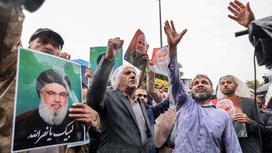 Demonstrators in Tehran's Palestine Square on September 28, 2024, after Hezbollah confirmed the killing of its leader Hassan Nasrallah