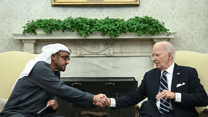 US President Joe Biden shakes hands with President of the United Arab Emirates Sheikh Mohamed bin Zayed al-Nahyan during a meeting in the Oval Office of the White House on September 23, 2024