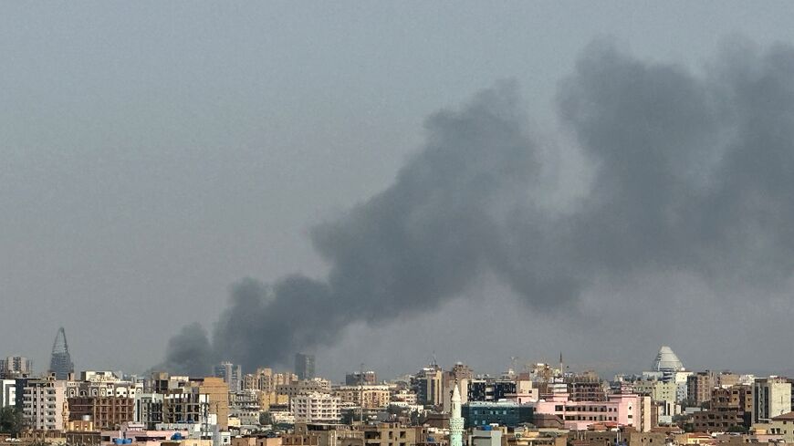 Smoke billowing over central Khartoum as the Sudanese army attacks paramilitary positions in the capital