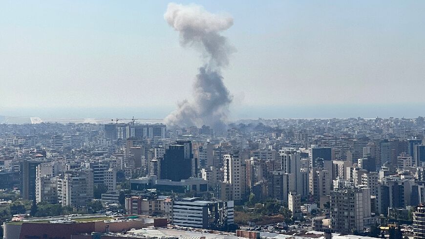 Smoke rises from the site of an Israeli air strike on Beirut's southern suburbs