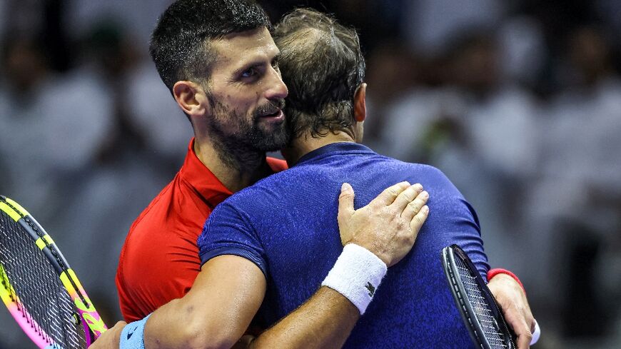 'Don't leave, man': Novak Djokovic and Rafael Nadal embrace after their match 