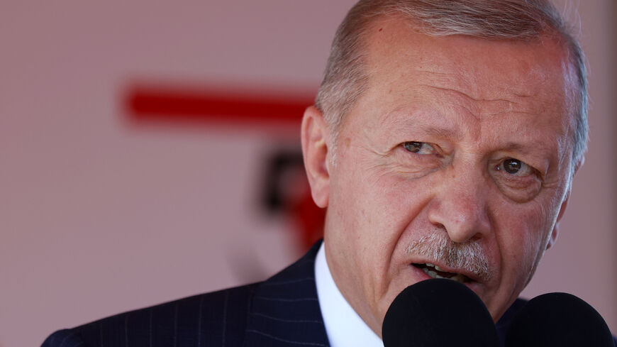 Turkish President Recep Tayyip Erdogan speaks during celebrations marking the 50th anniversary of Turkey's invasion of Cyprus on July 20, 2024 in occupied northern Nicosia, Cyprus.