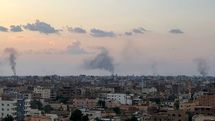 Smoke billows during air strikes in central Khartoum as the Sudanese Armed Forces attack positions held by the paramilitary Rapid Support Forces (RSF) throughout the Sudanese capital, about 18 months into their civil war