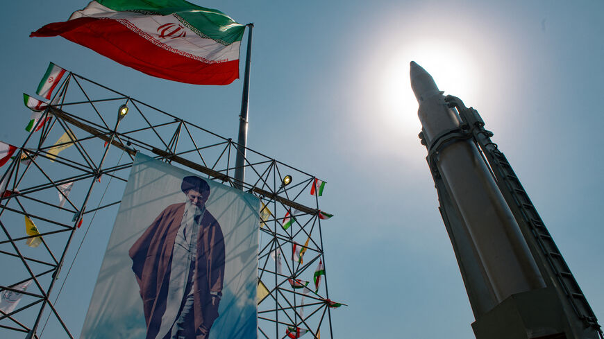 A big banner depicting Iran's Supreme Leader Ayatollah Ali Khamenei is placed next to a ballistic missile in Baharestan Square in Tehran, Iran, on Sept. 26, 2024 on the sideline of an exhibition which marks the 44th anniversary of the start of Iran-Iraq war.