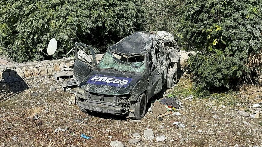 A car marked "Press" at the site of an Israeli airstrike that targeted an area where a number of journalists were located in the southern Lebanese village of Hasbaya, Oct. 25, 2024. 