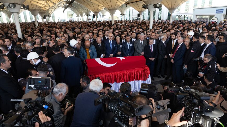 People and politicians attend the funeral of the victims of the October 23, 2024, attack at a Turkish defense company, TUSAS, in Ankara, Oct. 24, 2024.