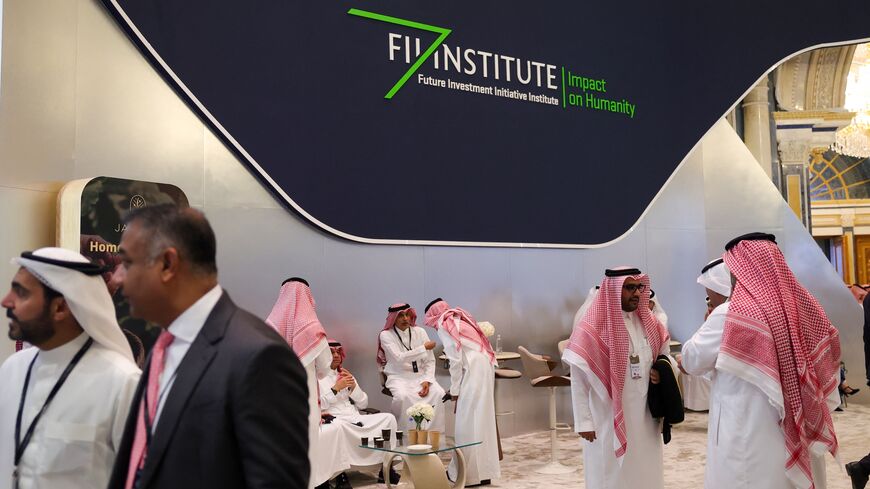 Participants arrive to attend the annual Future Investment Initiative conference in Riyadh, on Oct. 29, 2024.