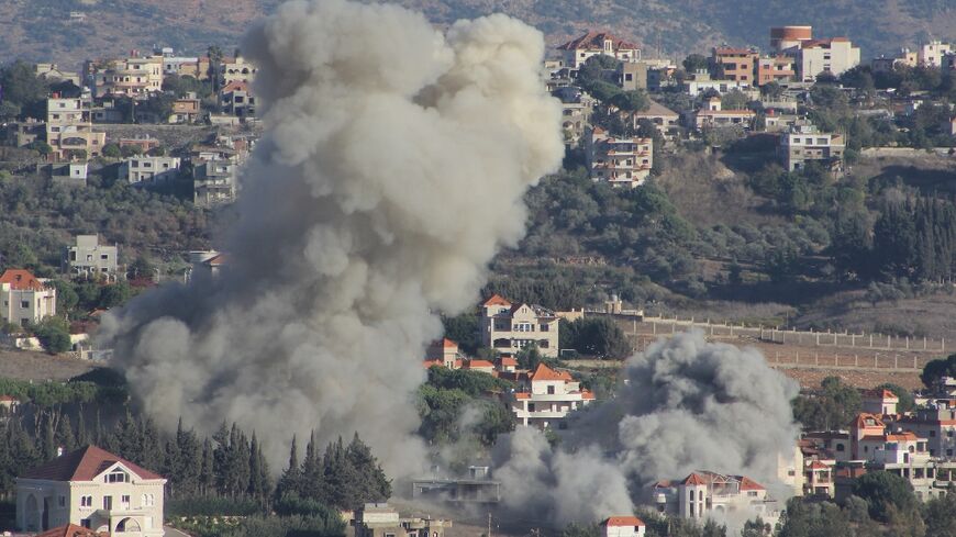 Smoke rises from the site of an Israeli air strike that targeted the southern Lebanese village of Khiam