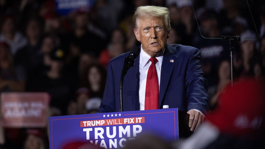 Republican presidential nominee former President Donald Trump speaks at a rally during the early-morning hours of election day on Nov. 5, 2024 in Grand Rapids, Michigan.