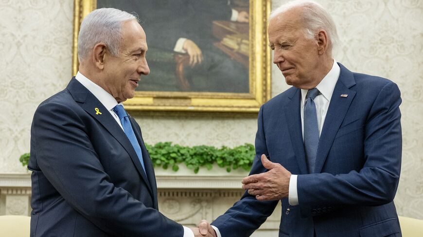 US President Joe Biden shakes hands with Israeli Prime Minister Benjamin Netanyahu during a meeting in the Oval Office of the White House in Washington, DC, on July 25, 2024. 