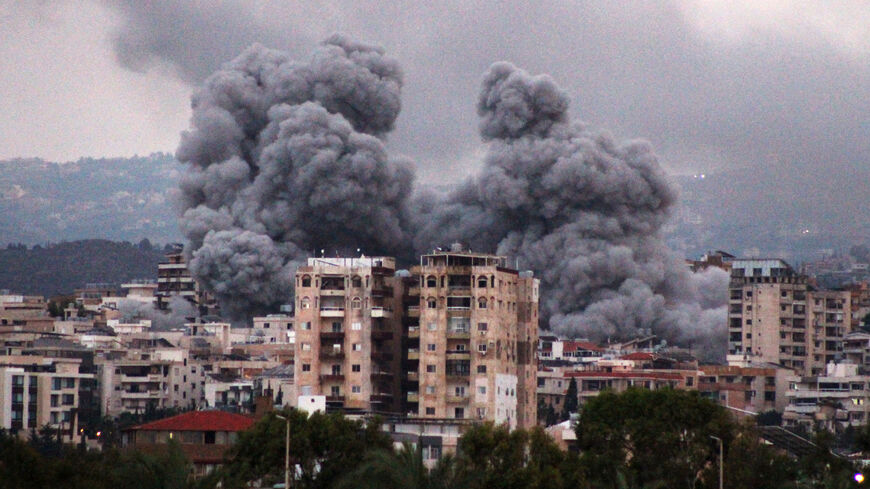 A photo taken from the southern Lebanese coastal city of Tyre shows smoke billowing following an Israeli airstrike which targeted the area of al-Hosh on the outskirts of Tyre, on November 19, 2024. (Photo by KAWNAT HAJU / AFP) (Photo by KAWNAT HAJU/AFP via Getty Images)