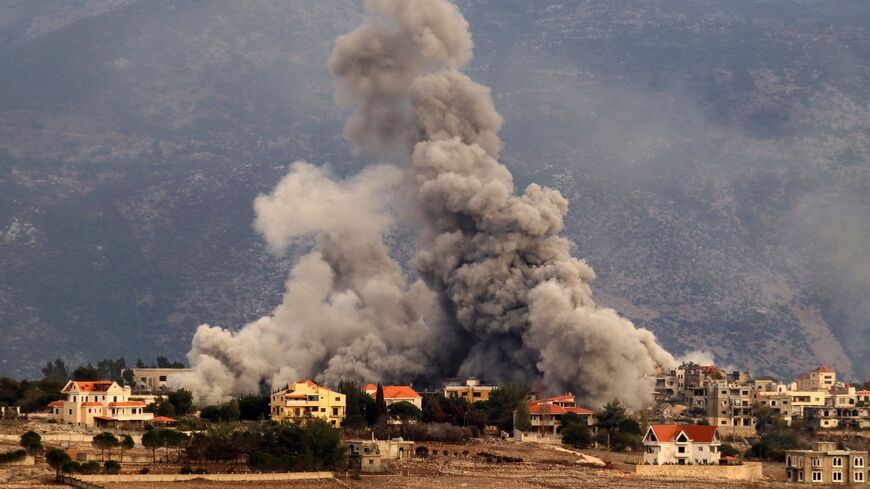 Smoke rises from the site of an Israeli airstrike that targeted the southern Lebanese border village of Khiam on Nov. 20, 2024, amid the ongoing war between Israel and Hezbollah. 