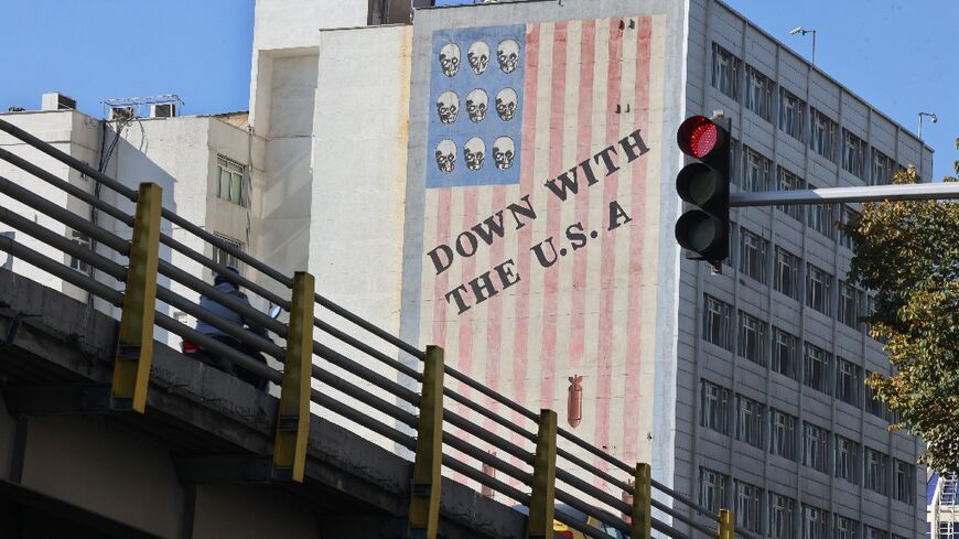 A large anti-US mural painted on the wall of a building in central Tehran