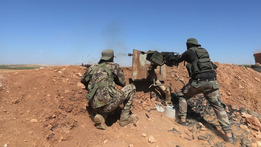 Fighters of Turkish-supported forces are positioned on the Buwayhij-Boughaz-Korhoyuk frontline on the outskirts of Manbij in northeastern Syria, as they fight with the Kurdish-led Syrian Democratic Forces (SDF) on Sept. 6, 2023. 