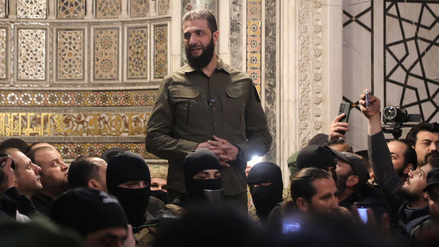 Abu Mohammed al-Golani, leader of Syria's Islamist Hayat Tahrir al-Sham group that headed a lightning rebel offensive snatching Damascus from government control, addresses a crowd at the Umayyad Mosque, Damascus, Syria, Dec. 8, 2024.