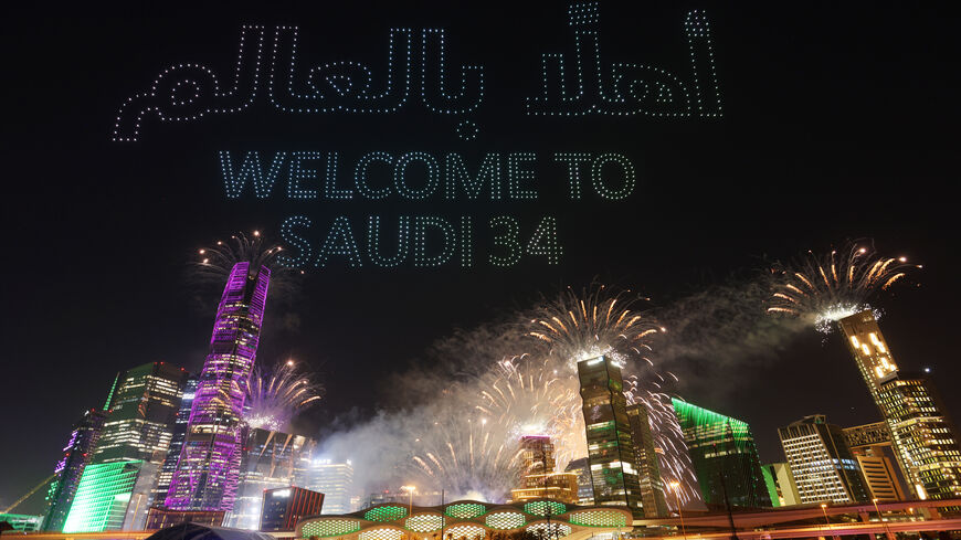 RIYADH, SAUDI ARABIA - DECEMBER 11: A drone show is seen displaying the words "Welcome to Saudi 34" as Saudi Arabia is announced as the host nation for the FIFA World Cup 2034 on December 11, 2024 in Riyadh, Saudi Arabia. (Photo by Christophe Viseux/Getty Images for Saudi Arabian Football Federation)