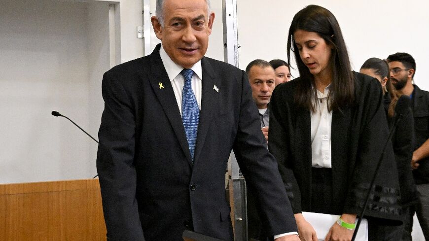 Israeli Prime Minister Benjamin Netanyahu attends the fifth day of testimony in his trial on corruption charges at the district court in Tel Aviv 