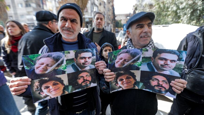 Demonstrators rally in the Syrian city of Douma demanding answers about the fate of four activists who were abducted 11 years ago, possibly by Islamist rebels