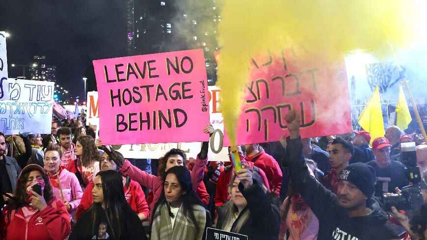 Israeli supporters of the hostages, who have kept up a campaign for their negotiated release for months, demonstrate in Tel Aviv on Saturday.