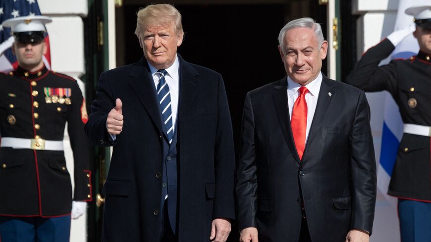 US President Donald Trump greets Israeli Prime Minister Benjamin Netanyahu as he arrives for meeting on the South Lawn of the White House in Washington, DC, Jan. 27, 2020.