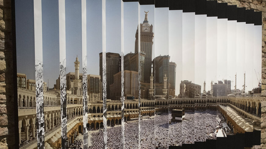 VENICE, ITALY - MAY 31: An Ahmed Angawi installation shows modern Makkah at "Rhizoma" Edge of Arabia a collateral event of the 55th International Art Exhibition, on May 31, 2013 in Venice, Italy. The 55th International Art Exhibition of La Biennale di Venezia will be open to the public from the June 1 - November 24, 2013. (Photo by Marco Secchi/Getty Images)