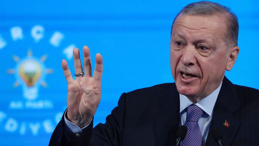 Turkish President Recep Tayyip Erdogan gestures as he speaks during the presentation of the Justice and Development Party's (AK Party) election manifesto at the AKP Congress Center in Ankara, on Jan. 30, 2024.