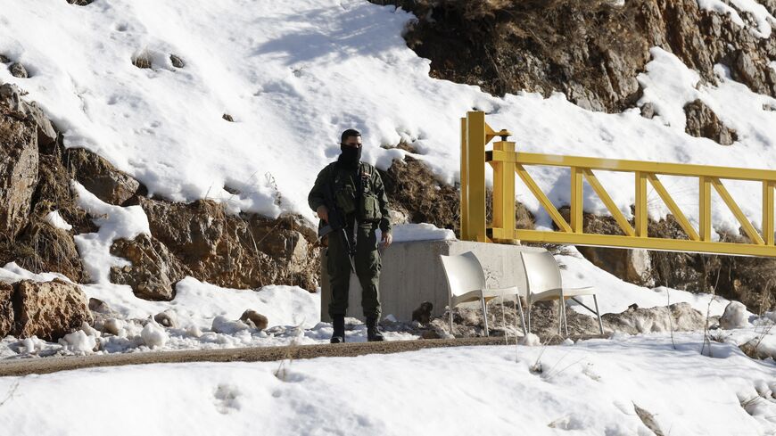 An Israeli soldier stands guard at the Hermon ski resort, bordering Syria and Lebanon, during a media tour organized by the spokesman of the Israeli army, in the Israeli-annexed Golan Heights on Jan. 8, 2025. 