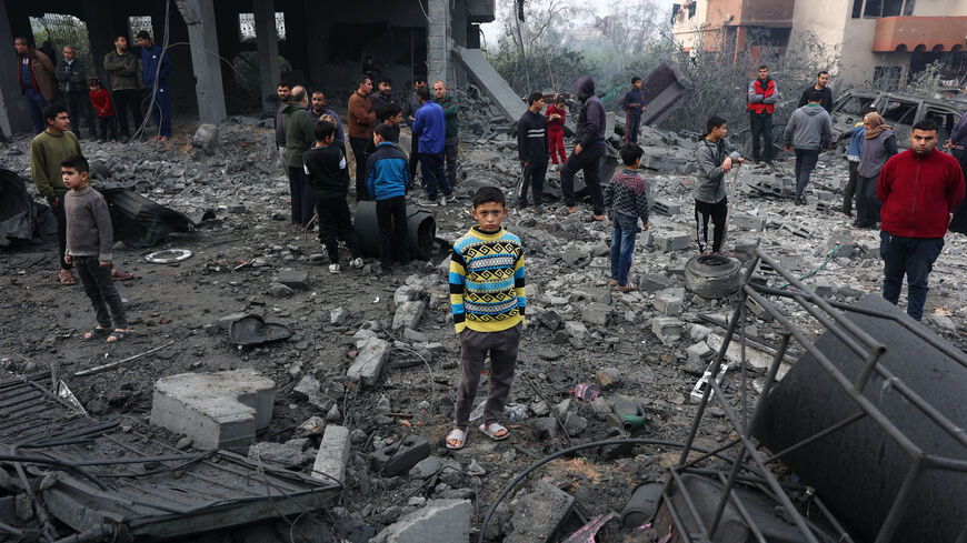 People check the rubble of buildings hit in Israeli strikes the previous night in Jabalia in the northern Gaza Strip, on Jan. 16, 2025, following a truce announcement amid the war between Israel and the Palestinian Hamas movement.