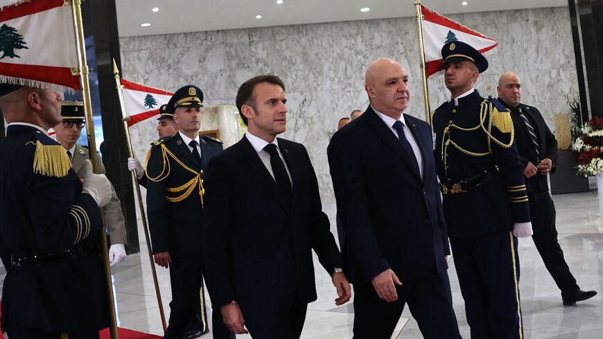 France's President Emmanuel Macron (L) is welcomed by Lebanon's new president, Joseph Aoun, at the presidential palace in Baabda, Beirut, Jan. 17, 2025.