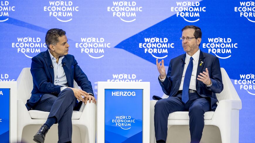 Israeli President Isaac Herzog (R) and CNN Indian American journalist Fareed Zakaria.