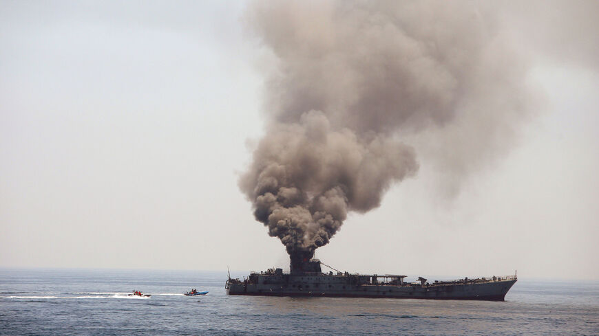 Iran's elite Revolutionary Guard boats attack a naval vessel during a three-day military drill in the Gulf on April 22, 2010. Iran's elite Revolutionary Guards launched a new "ultra-fast" boat capable of causing high destruction after testing it in a key oil supply route, at the start of a three-day military drill. AFP PHOTO/FARS NEWS/MEHDI MARIZAD (Photo credit should read MEHDI MARIZAD/AFP via Getty Images)