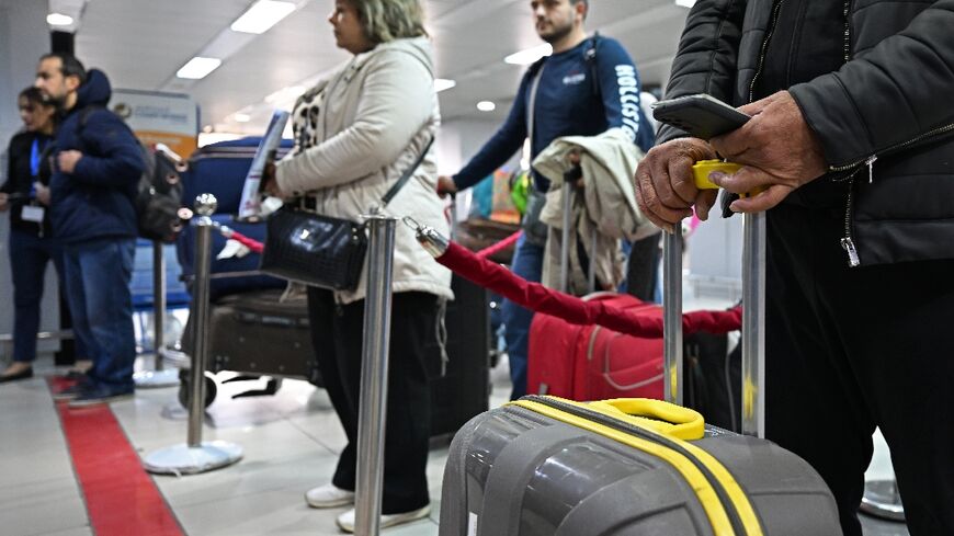 Travellers at Damascus airport on January 7, 2025