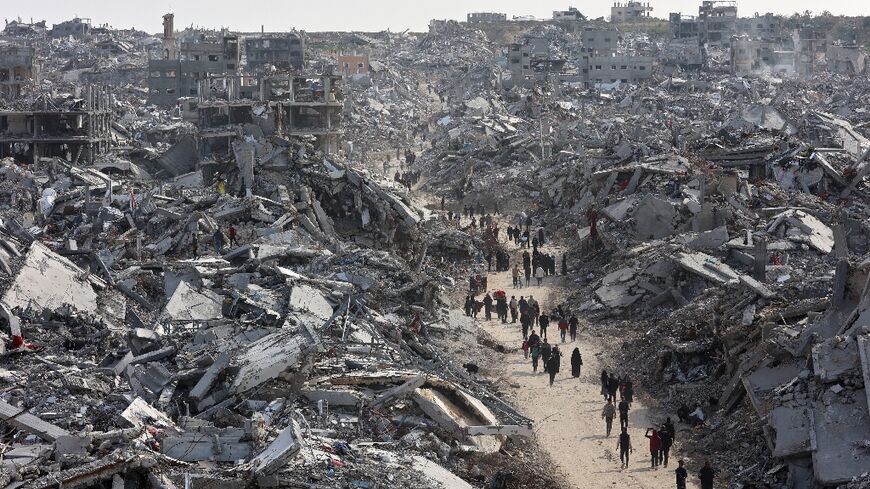 In the northern area of Jabalia, hundreds headed back to an apocalyptic landscape piled with rubble and destroyed buildings