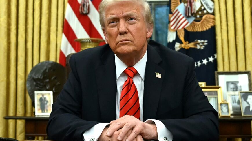 US President Donald Trump speaks to the press after signing an executive order in the Oval Office of the White House in Washington, DC, on February 10, 2025.  