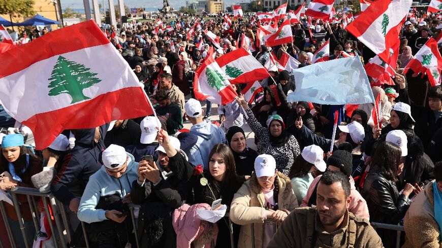 People gather in Beirut to mark the 20th anniversary of the assassination of ex-premier Rafic Hariri, and to hear his son Saad speak